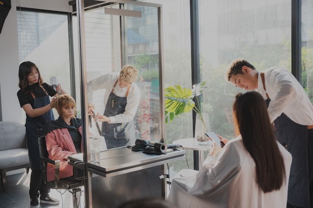 hairdresser-and-beautiful-client-woman-making-trea-2025-03-26-05-05-18-utc.jpg
