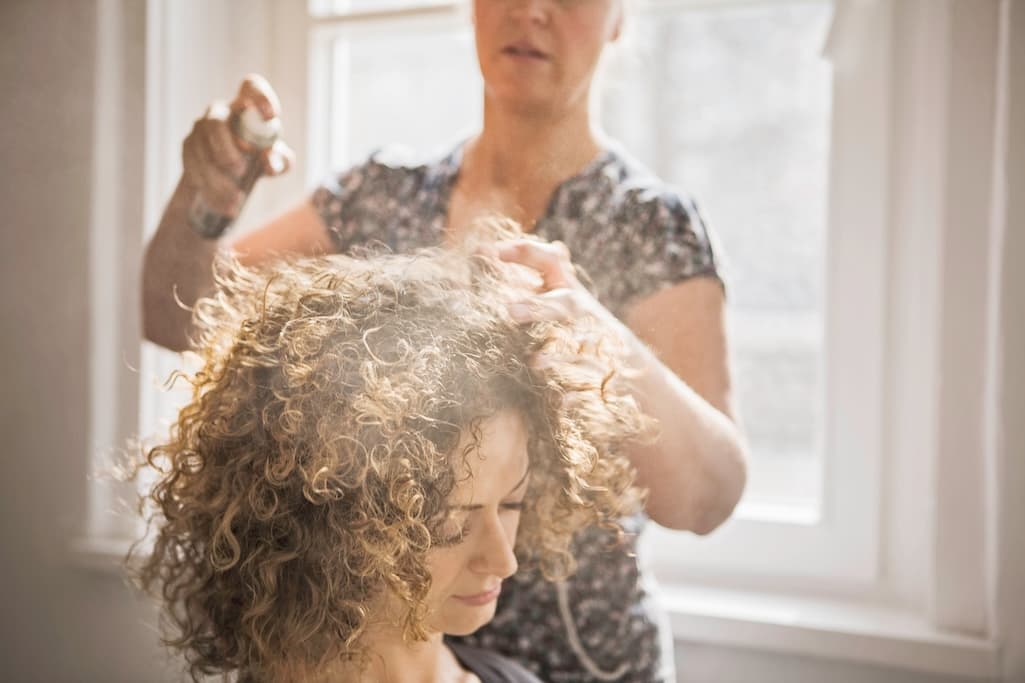 hair-stylist-working-on-client-2024-10-22-11-10-35-utc.jpg
